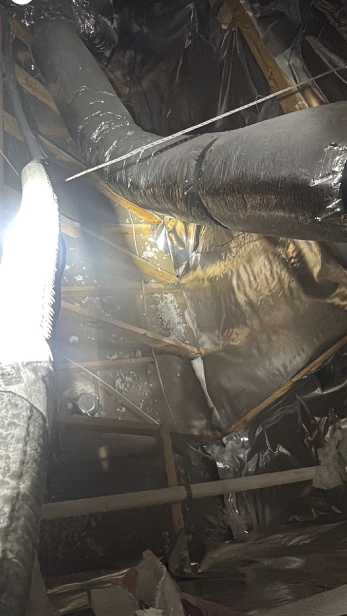 Ductwork and framing in a new-construction attic