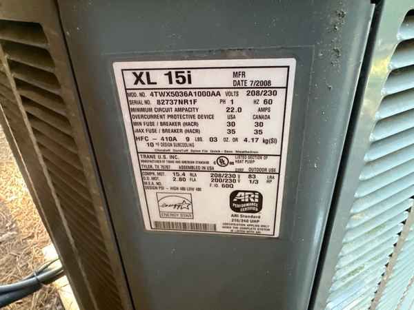 The unit's data plate, showing a manufacture date of July 2008
